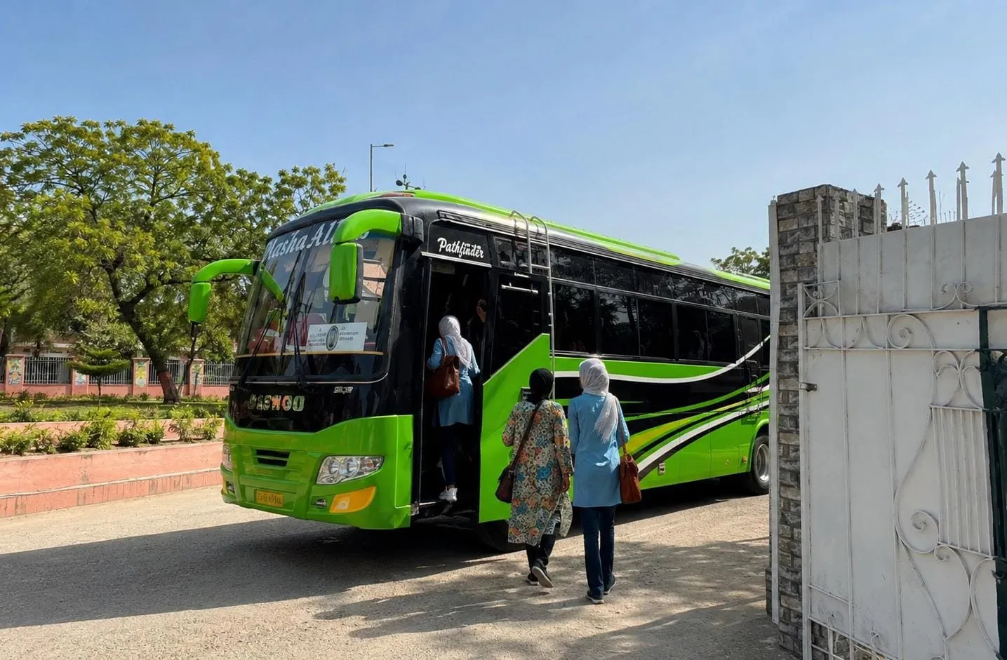 Students boarding the college bus at the GCE gate
